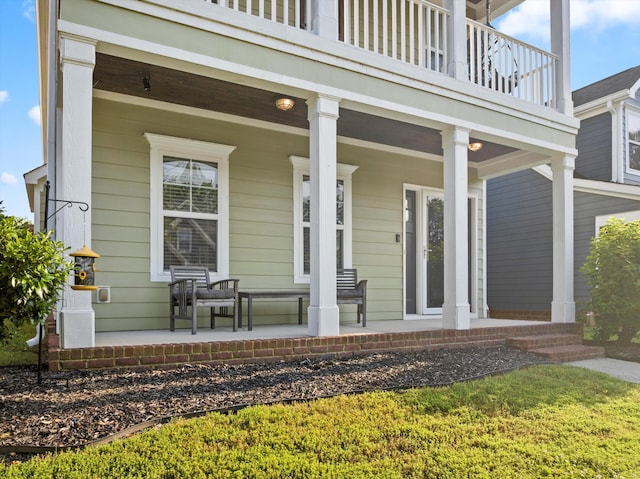 8833 Wilson Creek Dr, Ooltewah, TN 37363 - doorway to property featuring covered porch and a balcony