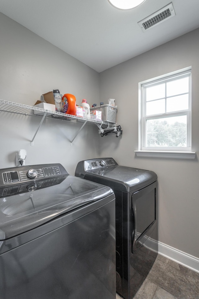 9600 Lovell Rd, Soddy Daisy, TN 37379 - washroom with washing machine and clothes dryer and baseboards