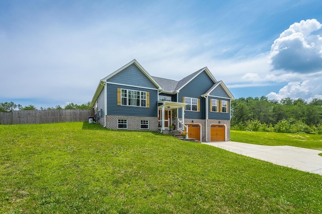 9600 Lovell Rd, Soddy Daisy, TN 37379 - raised ranch with concrete driveway and an attached garage
