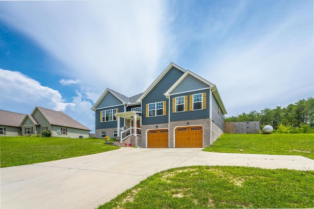 9600 Lovell Rd, Soddy Daisy, TN 37379 - view of front of property with an attached garage, concrete driveway, a front lawn, and brick siding