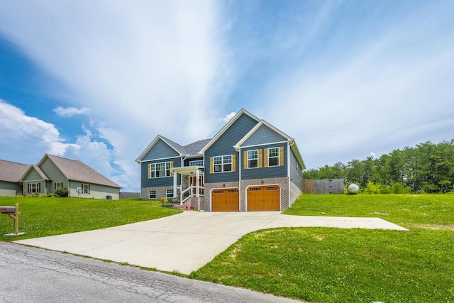 9600 Lovell Rd, Soddy Daisy, TN 37379 - split foyer home featuring an attached garage, a front yard, and concrete driveway