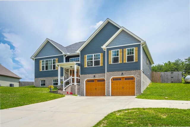 9600 Lovell Rd, Soddy Daisy, TN 37379 - split foyer home with a garage, driveway, and brick siding