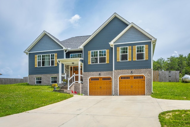 9600 Lovell Rd, Soddy Daisy, TN 37379 - bi-level home featuring a garage, driveway, and brick siding