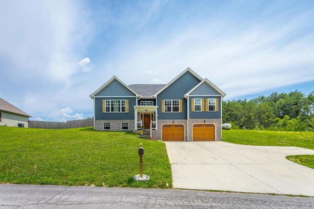 9600 Lovell Rd, Soddy Daisy, TN 37379 - raised ranch featuring an attached garage, driveway, and a front lawn