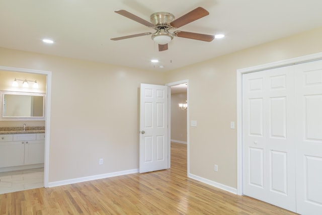 6102 Vance Rd, Chattanooga, TN 37421 - unfurnished bedroom featuring a closet, light wood-style flooring, connected bathroom, recessed lighting, and a ceiling fan