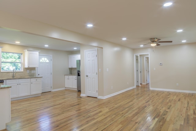 6102 Vance Rd, Chattanooga, TN 37421 - unfurnished living room with a ceiling fan, light wood finished floors, and recessed lighting