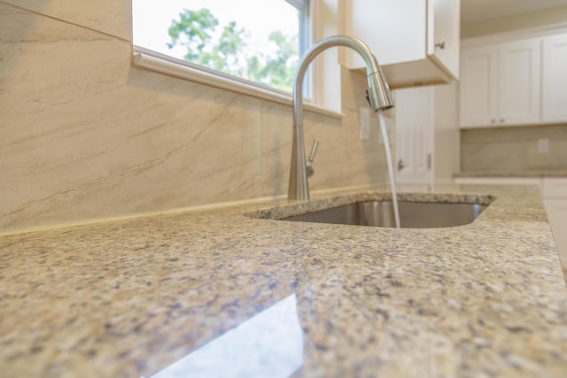 6102 Vance Rd, Chattanooga, TN 37421 - kitchen view of white cabinetry and light stone countertops