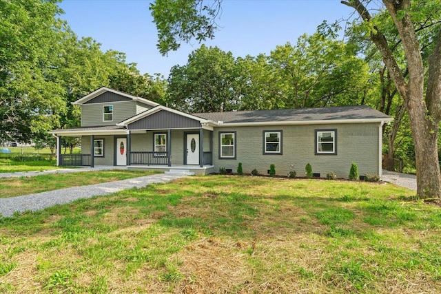 54 Austin Cir, Rossville, GA 30741 - view of front facade with covered porch, a front lawn, and brick siding