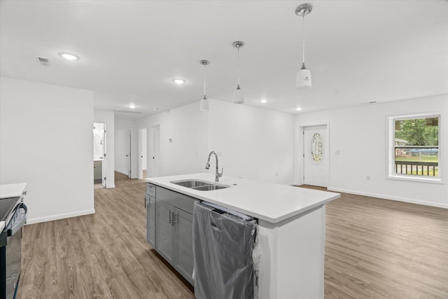 54 Austin Cir, Rossville, GA 30741 - kitchen with gray cabinetry, light wood finished floors, light countertops, decorative light fixtures, and recessed lighting
