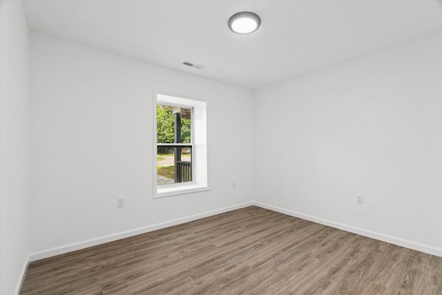 54 Austin Cir, Rossville, GA 30741 - unfurnished room featuring wood finished floors and baseboards