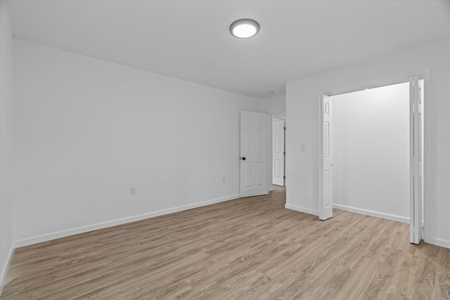 54 Austin Cir, Rossville, GA 30741 - unfurnished bedroom featuring light wood-style flooring and baseboards