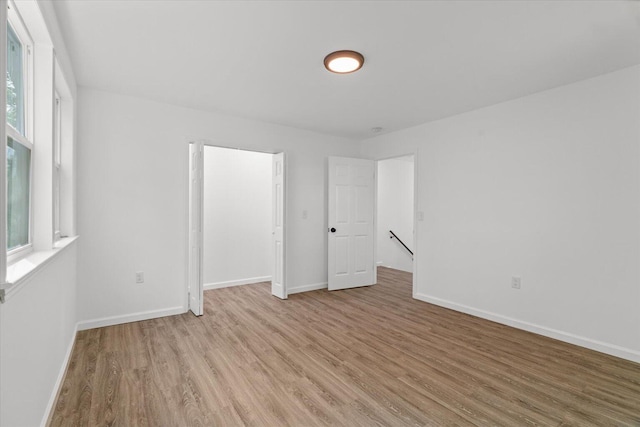 54 Austin Cir, Rossville, GA 30741 - spare room featuring light wood-style flooring and baseboards