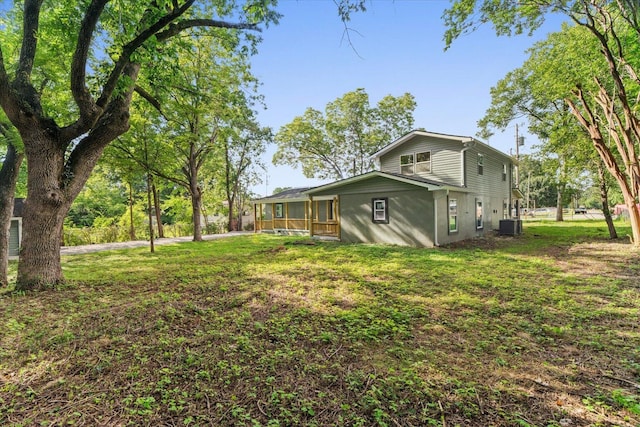 54 Austin Cir, Rossville, GA 30741 - view of property exterior featuring a central AC unit and a lawn