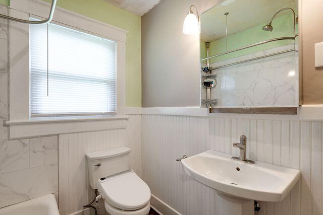 3313 Harrison Pike, Chattanooga, TN 37416 - full bathroom with a wainscoted wall, a shower, and a bath