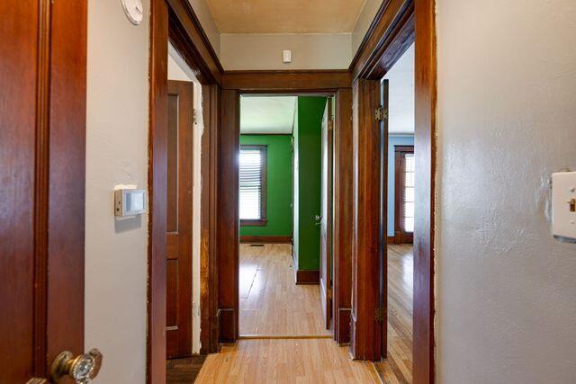 3313 Harrison Pike, Chattanooga, TN 37416 - hallway with light wood finished floors and baseboards