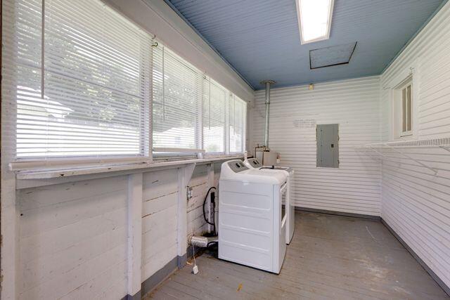 3313 Harrison Pike, Chattanooga, TN 37416 - washroom featuring electric panel, wood finished floors, washing machine and clothes dryer, and attic access