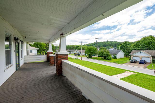 3313 Harrison Pike, Chattanooga, TN 37416 - porch featuring a lawn