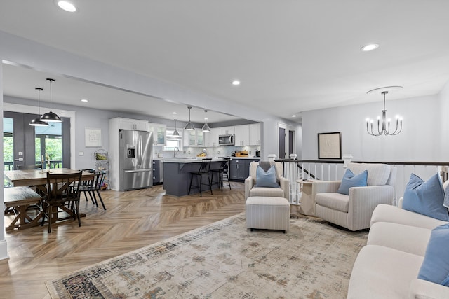 7622 Nadick Ln, Hixson, TN 37343 - living area featuring plenty of natural light, recessed lighting, and a chandelier