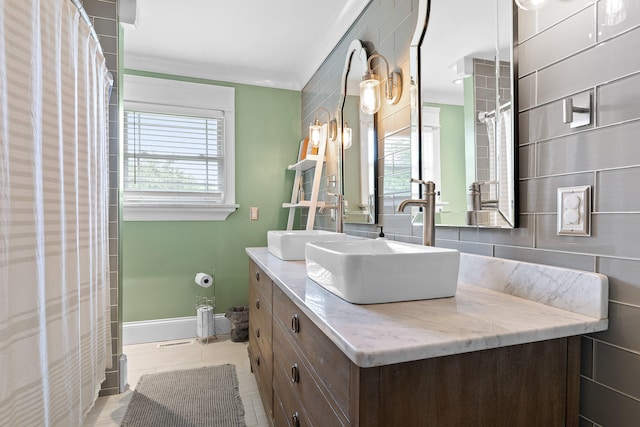 7622 Nadick Ln, Hixson, TN 37343 - full bathroom featuring vanity, ornamental molding, and tile patterned floors