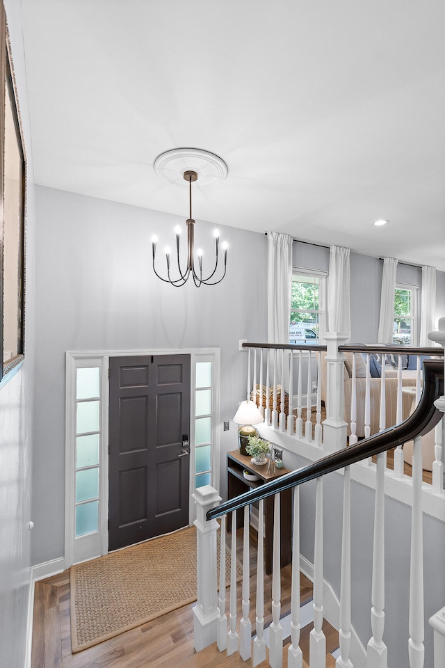 7622 Nadick Ln, Hixson, TN 37343 - foyer entrance with a chandelier and wood finished floors