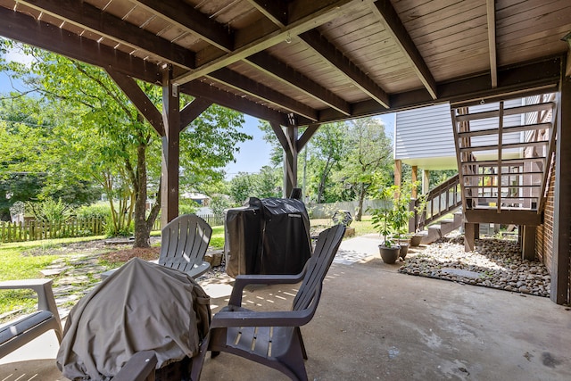 7622 Nadick Ln, Hixson, TN 37343 - fenced backyard with stairway, a patio, and area for grilling