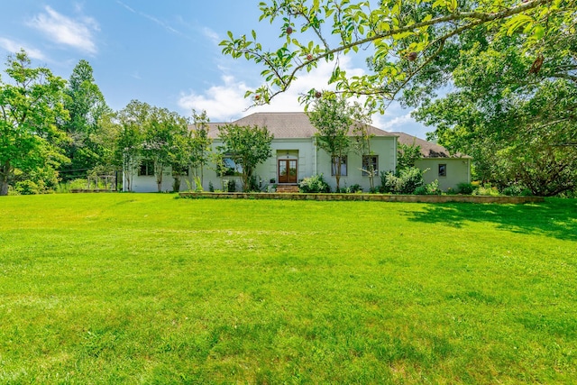 11216 Ooltewah Georgetown Rd, Georgetown, TN 37336 - view of front facade with a front lawn, french doors, and stucco siding