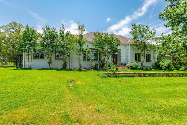 11216 Ooltewah Georgetown Rd, Georgetown, TN 37336 - view of front of property with a front yard and stucco siding