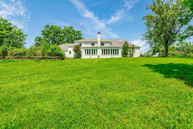 11216 Ooltewah Georgetown Rd, Georgetown, TN 37336 - back of property with a lawn and a chimney