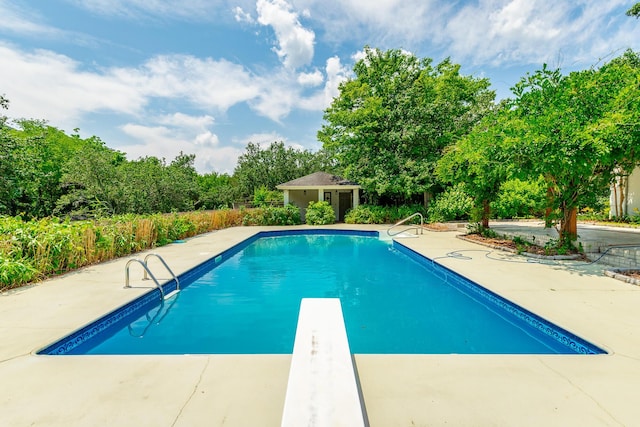 11216 Ooltewah Georgetown Rd, Georgetown, TN 37336 - view of pool featuring an outdoor structure, a storage structure, a patio, and a diving board