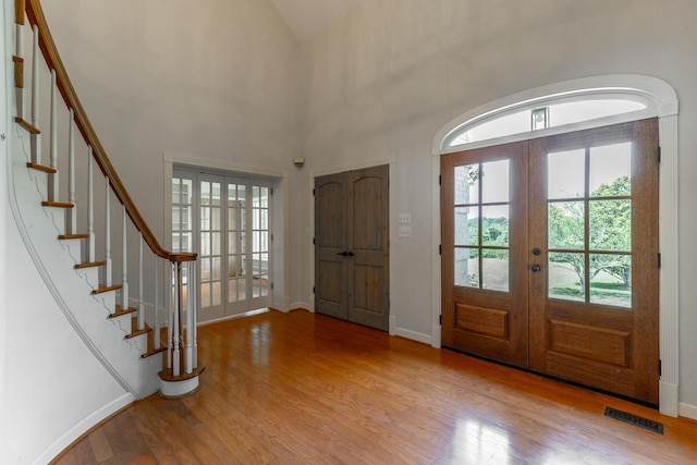 11216 Ooltewah Georgetown Rd, Georgetown, TN 37336 - entryway featuring french doors, wood finished floors, and stairway