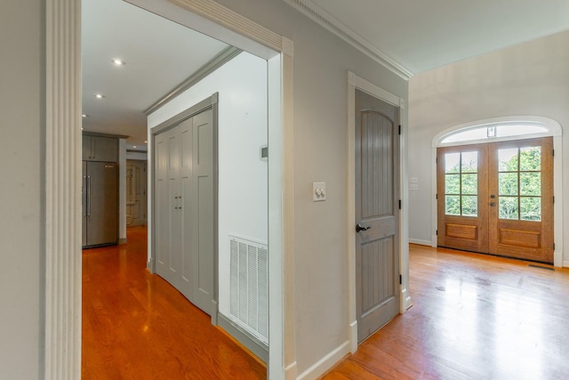 11216 Ooltewah Georgetown Rd, Georgetown, TN 37336 - hall with french doors, light wood-style floors, crown molding, and recessed lighting