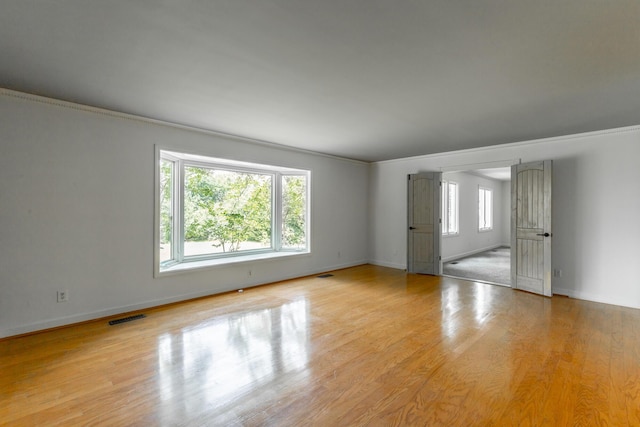 11216 Ooltewah Georgetown Rd, Georgetown, TN 37336 - unfurnished room with wood finished floors and ornamental molding