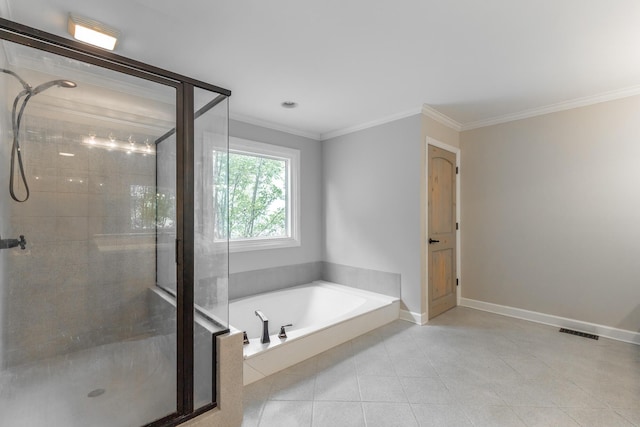 11216 Ooltewah Georgetown Rd, Georgetown, TN 37336 - bathroom with a stall shower, ornamental molding, a garden tub, and tile patterned floors