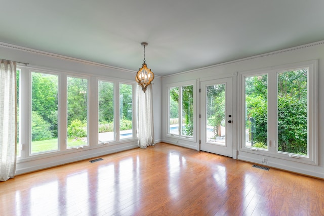 11216 Ooltewah Georgetown Rd, Georgetown, TN 37336 - unfurnished sunroom with a chandelier and plenty of natural light
