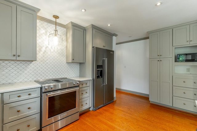 11216 Ooltewah Georgetown Rd, Georgetown, TN 37336 - kitchen with appliances with stainless steel finishes, crown molding, light countertops, backsplash, and gray cabinets