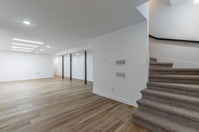 11216 Ooltewah Georgetown Rd, Georgetown, TN 37336 - finished basement featuring stairway, light wood-style flooring, and recessed lighting