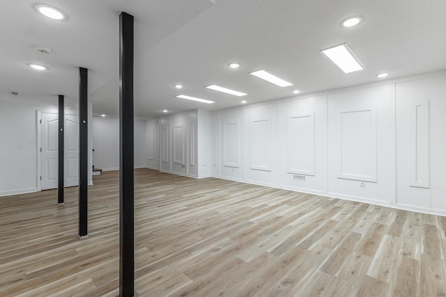 11216 Ooltewah Georgetown Rd, Georgetown, TN 37336 - below grade area featuring light wood-type flooring and recessed lighting