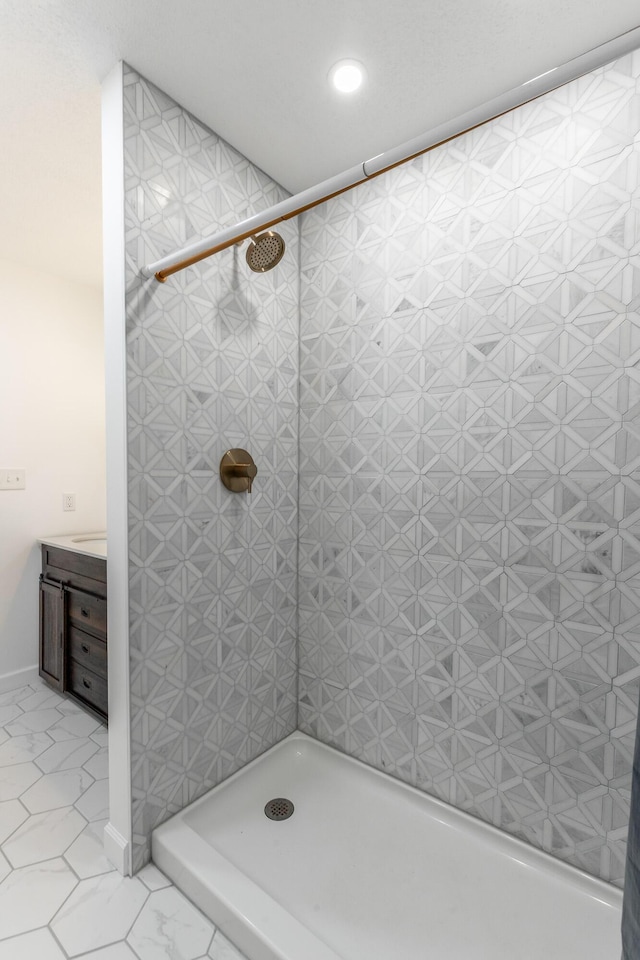 11216 Ooltewah Georgetown Rd, Georgetown, TN 37336 - bathroom with recessed lighting, tiled shower, and vanity