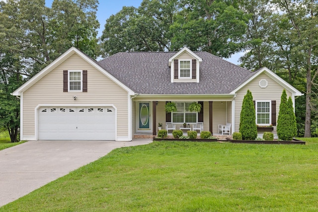 651 Howard Leonard Rd, Ringgold, GA 30736 - view of front of home with covered porch, a shingled roof, driveway, and a front lawn