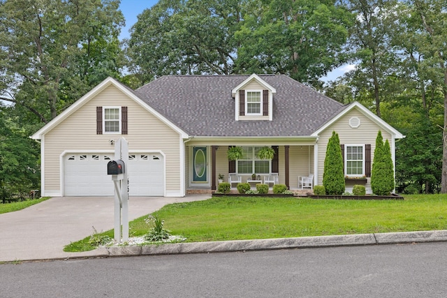 651 Howard Leonard Rd, Ringgold, GA 30736 - view of front of property with covered porch, driveway, a shingled roof, a front yard, and a garage