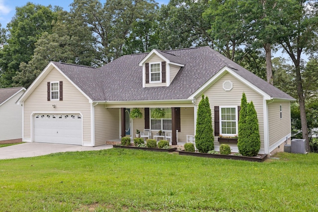 651 Howard Leonard Rd, Ringgold, GA 30736 - view of front of home featuring covered porch, concrete driveway, a front yard, and a shingled roof