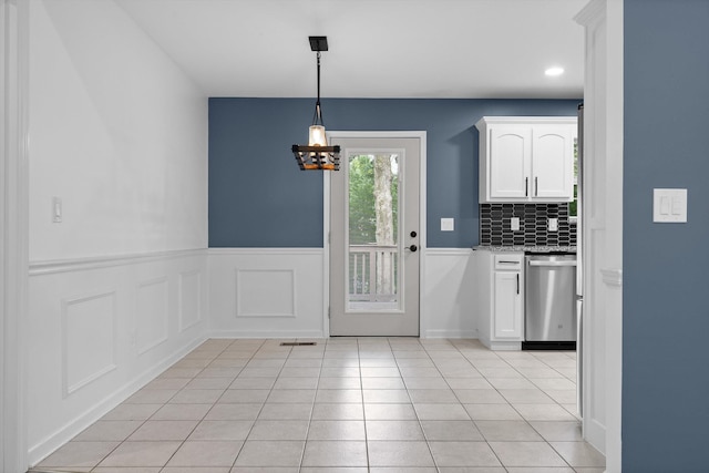 651 Howard Leonard Rd, Ringgold, GA 30736 - kitchen featuring stainless steel dishwasher, a chandelier, white cabinets, wainscoting, and decorative backsplash