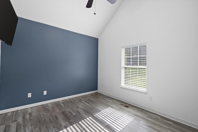 651 Howard Leonard Rd, Ringgold, GA 30736 - empty room featuring ceiling fan, wood finished floors, and high vaulted ceiling