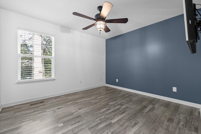 651 Howard Leonard Rd, Ringgold, GA 30736 - spare room featuring wood finished floors and a ceiling fan