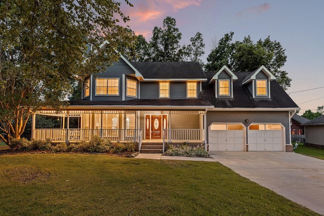 8512 Creek Stone Dr, Chattanooga, TN 37421 - view of front facade with a porch, an attached garage, driveway, and a front lawn
