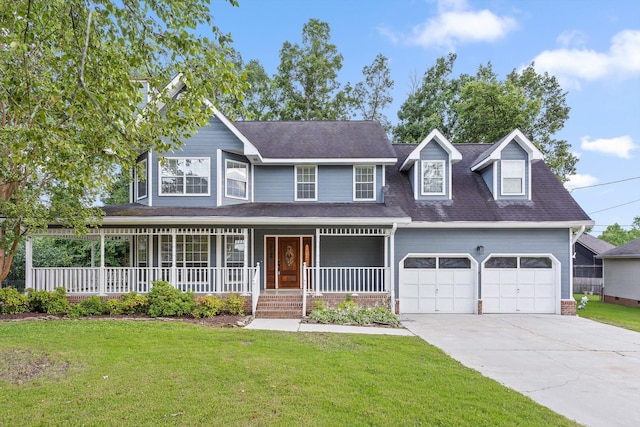 8512 Creek Stone Dr, Chattanooga, TN 37421 - view of front of home with covered porch, an attached garage, driveway, and a front lawn