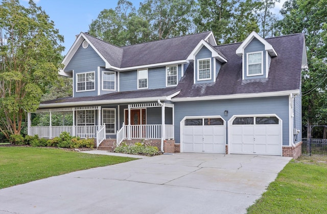 8512 Creek Stone Dr, Chattanooga, TN 37421 - view of front of home with a porch, a front lawn, driveway, an attached garage, and a shingled roof