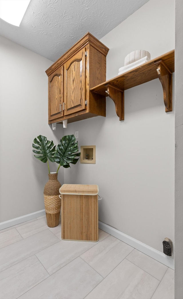 8512 Creek Stone Dr, Chattanooga, TN 37421 - laundry area with hookup for a washing machine and light tile patterned floors