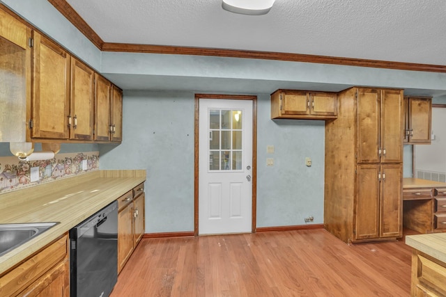 1259 Leaside Ln, Hixson, TN 37343 - kitchen with dishwasher, brown cabinetry, light wood finished floors, a textured ceiling, and light countertops