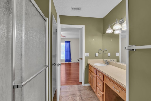 1259 Leaside Ln, Hixson, TN 37343 - full bath featuring vanity, tile patterned floors, and an enclosed shower